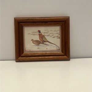 1980 vintage framed print depicting a male and female pheasant in a snowy land